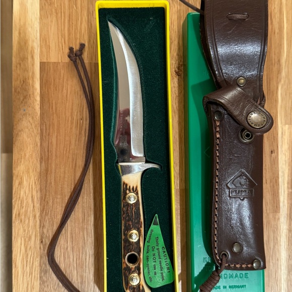 Puma Other - Puma Men's Skinner Knife 1970 with Leather Sheath - razor sharp carbon steel.